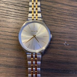 Nixon woman’s two tone watch